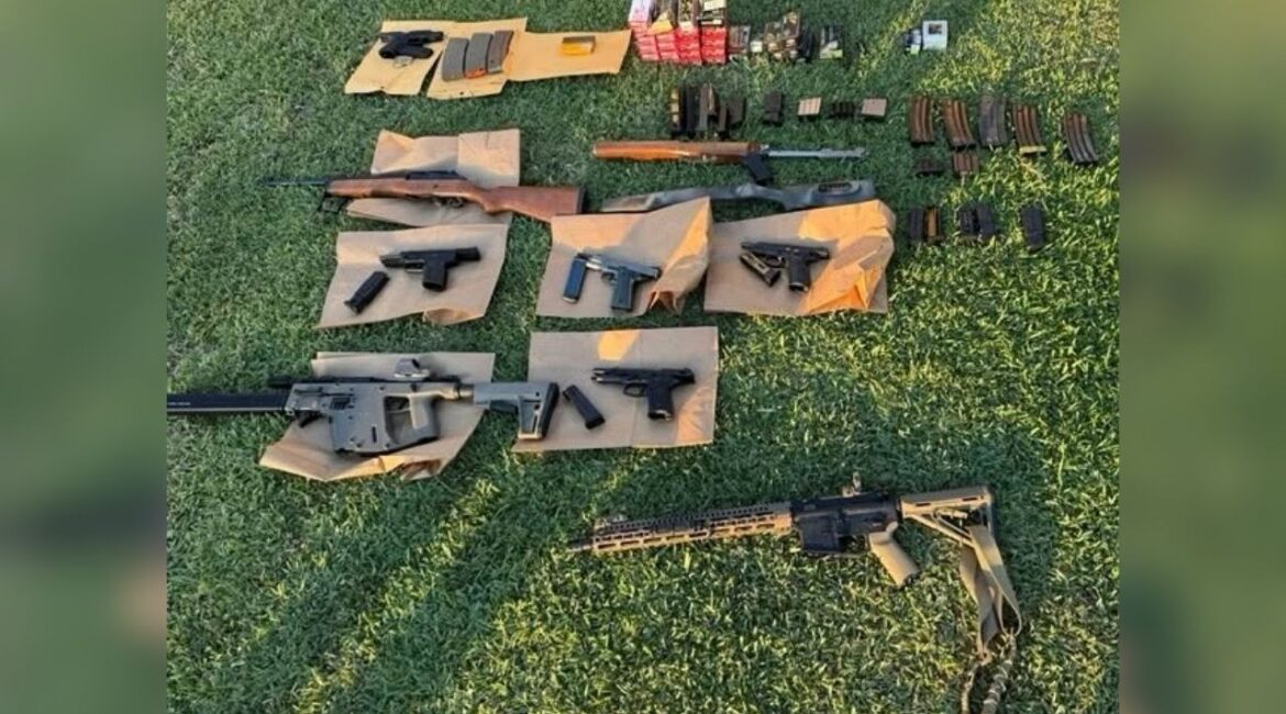 Visalia police arrested Jordan Uvalle, 21, after a Sunday morning threat investigation led officers to seize eight firearms, including a ghost AR-15 rifle. (Visalia PD)