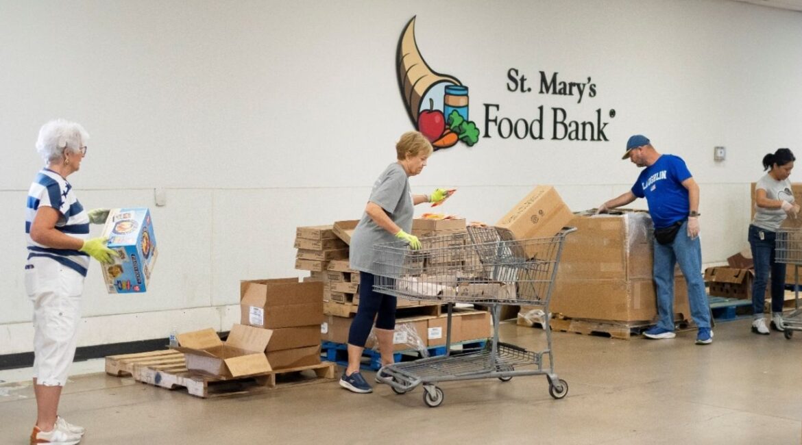 Volunteers assemble food boxes during a daily food distribution at St. Mary's Food Bank in Phoenix, U.S. May 29, 2026. REUTERS/Rebecca Noble