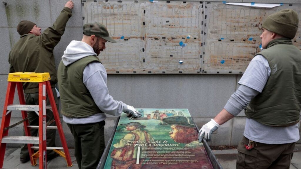 Workers from the National Park Service reinstall a slavery exhibit at a historic site in Philadelphia, following a U.S. judge order to reinstall, in Pennsylvania, U.S., February 19, 2026. (Reuters File)