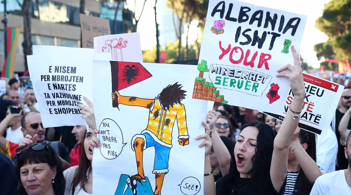 Protesters hold banners during a protest against a luxury resort development planned by a company linked with Donald Trump's son-in-law, Jared Kushner, on an environmentally sensitive part of the Adriatic coast, in Tirana, Albania, June 4, 2026. (Reuters/Florion Goga)