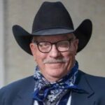 Portrait of Larry Byrd in a black cowboy hat