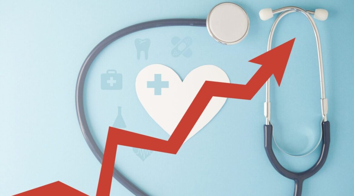 Composite image of a stethoscope and a rising red arrow symbolizing health insurance rate increases