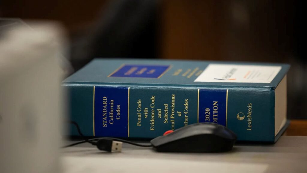image of a penal code book with a green cover positioned on its side