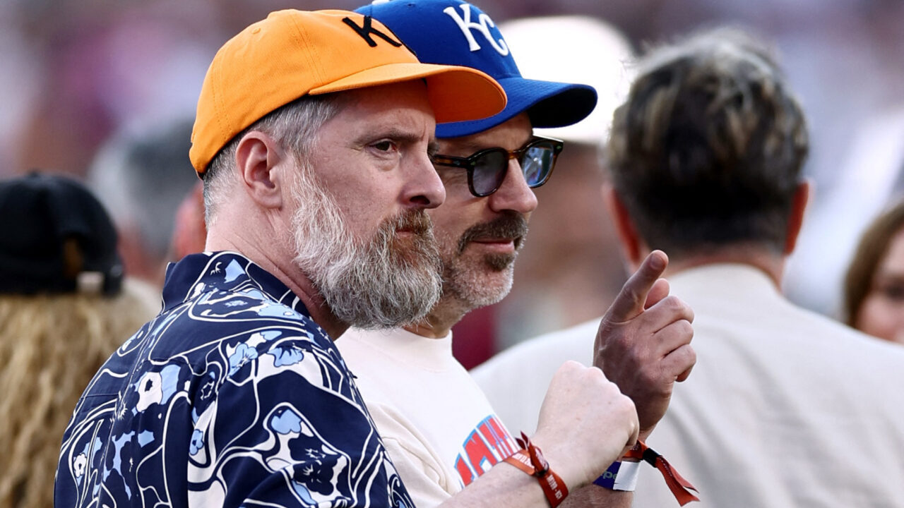 Image of actors Brendan Hunt and Jason Jason Sudeikis, facing right, and wearing ballcaps