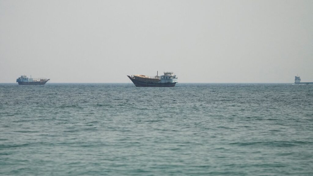 Image of ships in the Straight of Homuz in relatively calm waters