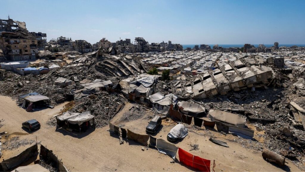 A general view of the rubble of residential buildings destroyed during the Israeli offensive and tents sheltering displaced Palestinians in Gaza City, July 4, 2026. (Reuters/Mahmoud Issa)