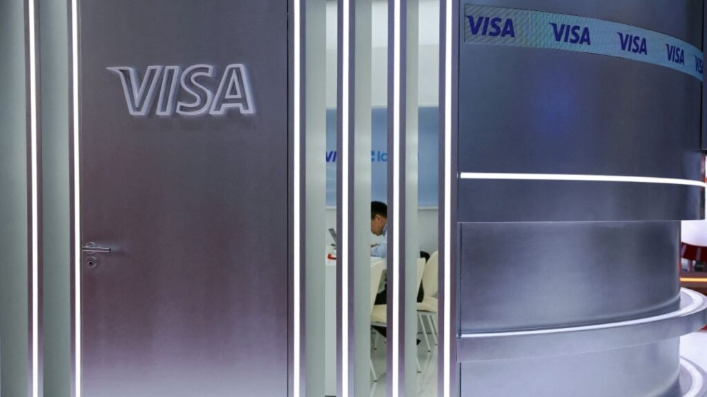 A man sits in a room at the Visa booth during the China International Supply Chain Expo (CISCE) in Beijing, China June 22, 2026. (Reuters File)