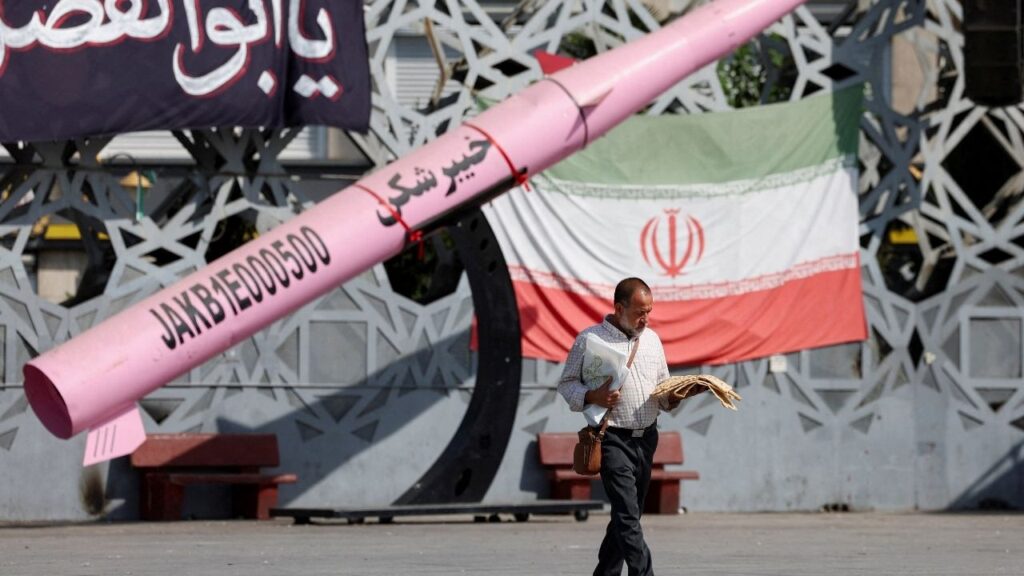 A man walks next to a symbolic mockup of an Iranian missile and an Iranian flag at Imam Hussein Square in Tehran, Iran, July 12, 2026. (Reuters File)