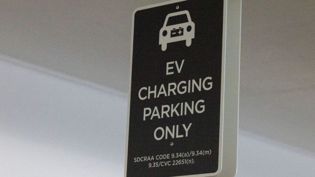 A view shows a parking sign for electric vehicles only at San Diego International Airport's New Terminal 1 in San Diego, California, U.S. August 26, 2025. (Reuters/Mike Blake)