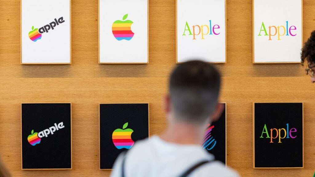 Apparel for sale during Apple’s annual developers’ conference at company headquarters in Cupertino, Calif., June 8, 2026. Apple overtook the chipmaker Nvidia on Monday, July 27, to become the world’s most valuable publicly traded company, about two years after it lost the crown. (Jason Henry/The New York Times)
