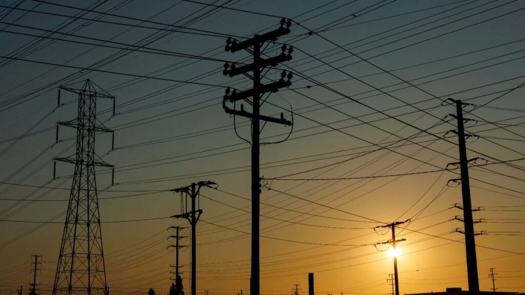 Electrical transmission towers, poles and lines are shown in the early morning of a hot summer day in Commerce, California, U.S, August 7, 2025. (Reuters File)