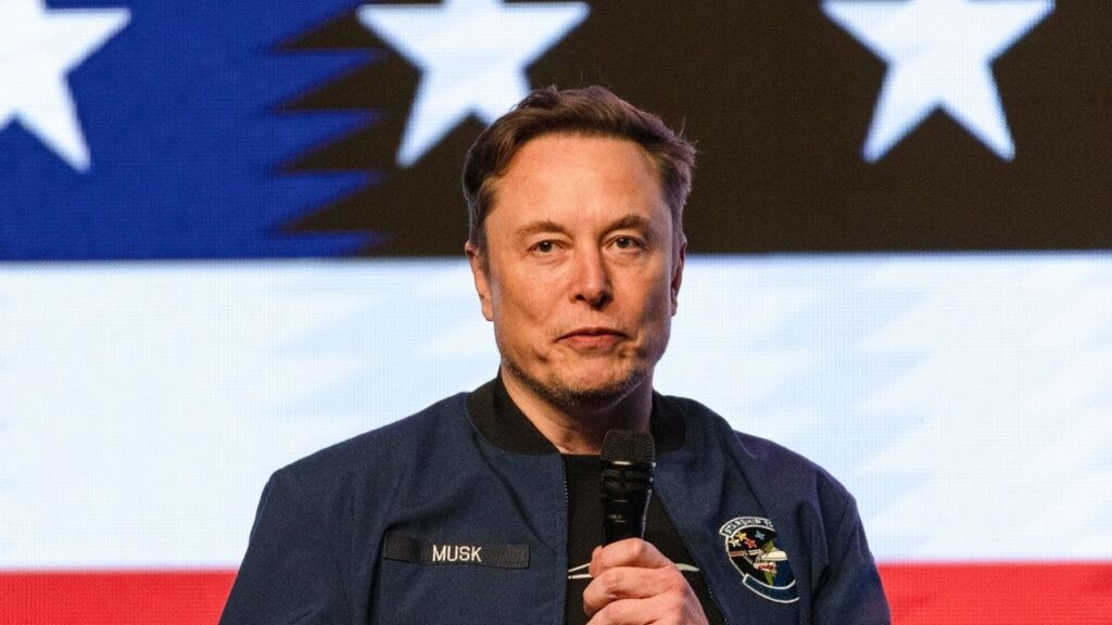 Elon Musk speaks at an event in support of a conservative Wisconsin Supreme Court candidate in Green Bay, Wis., March 30, 2025. Elon Musk, a year after a huge blowup with President Trump and the Republican Party, is said to be planning to spend in at least eight states to help them in November. (Jim Vondruska/The New York Times)