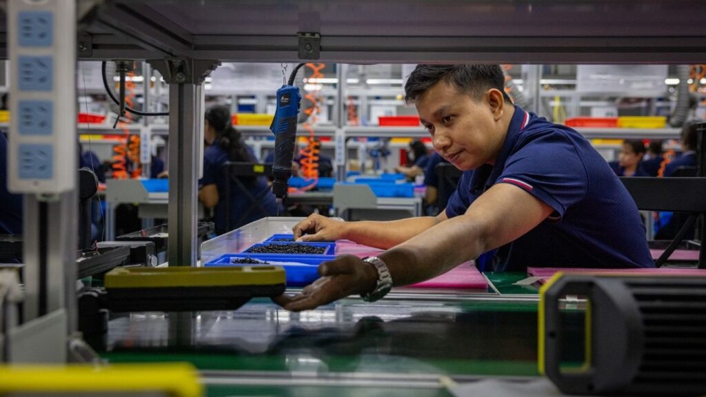 Factory workers assemble lighting products at Ningbo Bright Electric in Rayong, Thailand, July 20, 2026. One of the most surprising outcomes from a whiplash year of tariffs may be that China has emerged in a position of relative strength, with significantly lower tariffs than last year. (Lauren DeCicca/The New York Times)