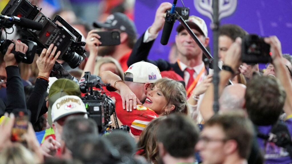 Feb 11, 2024; Paradise, Nevada, USA; Kansas City Chiefs tight end Travis Kelce (87) hugs recording artist Taylor Swift after winning Super Bowl LVIII against the San Francisco 49ers at Allegiant Stadium. (Kyle Terada-USA TODAY Sports/File Photo)