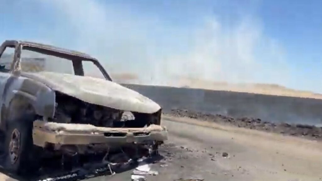 Firefighters were battling a vegetation fire near Kettleman City on Friday that included an apparent vehicle fire. (GV Wire)