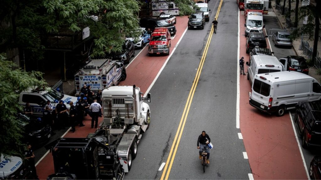 First responders gather on a closed street near the compromised former Pfizer headquarters on East 42nd Street in New York, on Tuesday, July 7, 2026. New York Mayor Zohran Mamdani said the high-profile housing project under construction near Grand Central Terminal, and at risk of collapse, was still unstable Tuesday afternoon and warned New Yorkers to avoid the area. (Dave Sanders/The New York Times)