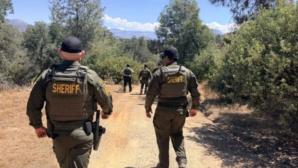 Fresno County Sheriff Officers walk to a residence to serve a search warrant During Operation Gold Star on Wednesday, July 15, 2026. (GV Wire/Anthony W. Haddad)