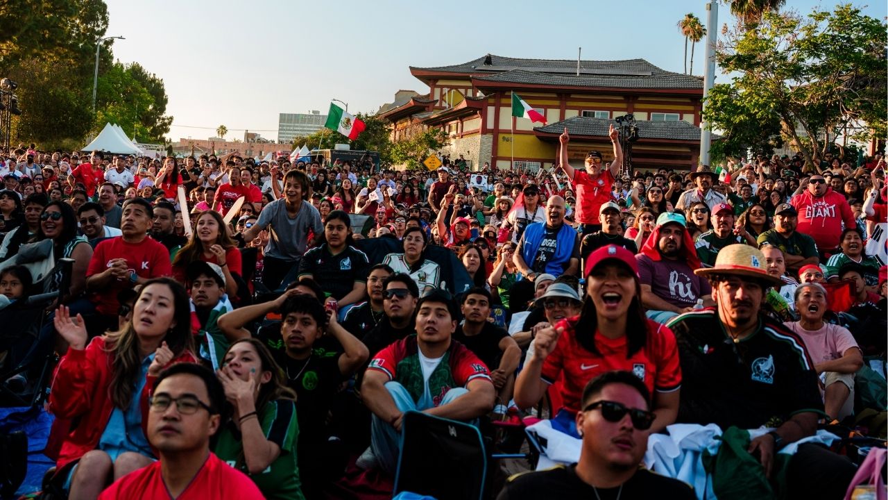 Fans gather at Seoul International Park in Los Angeles to watch Mexico play South Korea in a World Cup soccer match on June 18, 2026. Amid protests and rancor, the World Cup has been a bright spot in the United States and around the world. (Gabriela Bhaskar/The New York Times)