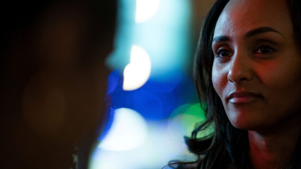 Melat Kiros, Democratic candidate for the U.S. House of Representatives from Colorado's 1st Congressional District, meets with members of Washington, D.C.'s Ethiopian diaspora during an event at Punch Bowl Social in Arlington, Virginia, U.S., March 15, 2026. REUTERS/Elizabeth Frantz