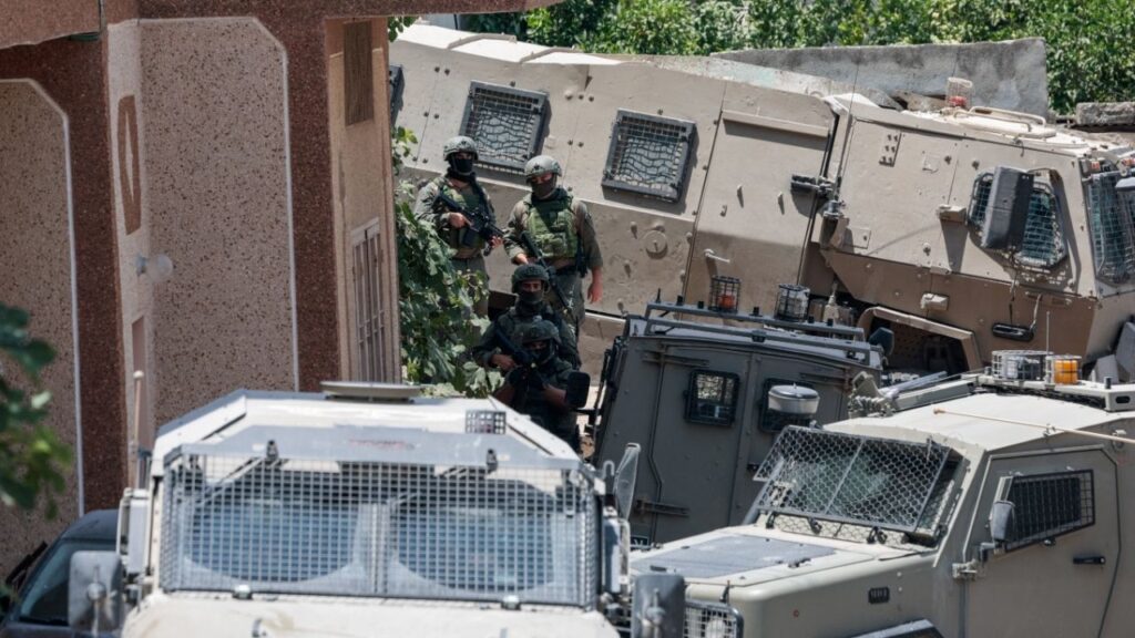 Members of the Israeli forces take part in a raid in Tal, near Nablus, the day after four Palestinians and two Israeli soldiers were killed in a shooting incident, in the Israeli-occupied West Bank, July 25, 2026. REUTERS/Mohammed Torokman