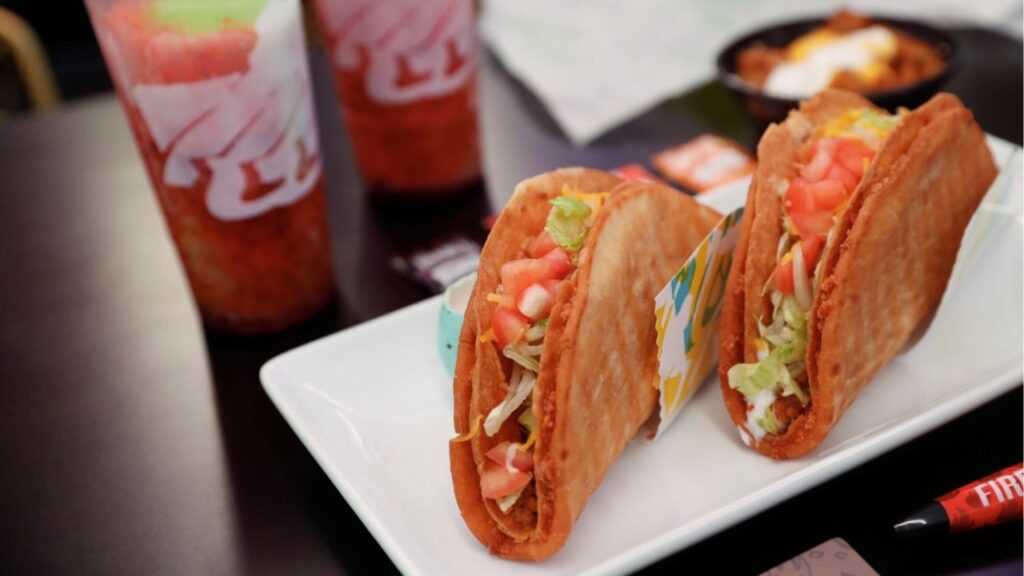 A Taco Bell order and drinks sit inside the first digital-only U.S. location at Times Square in New York City, U.S., April 14, 2021. ReutersShannon Stapleton/ File Photo