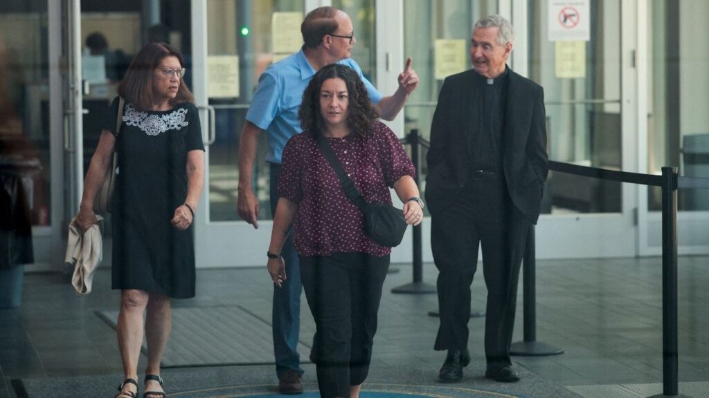 Michael and Paula Musgrove, the parents of Lindsay Clancy, who is accused of killing her children, leave the Plymouth Superior courthouse in Plymouth, Massachusetts, U.S., July 27, 2026. Picture taken through a window. (Reuters/Brian Snyder)