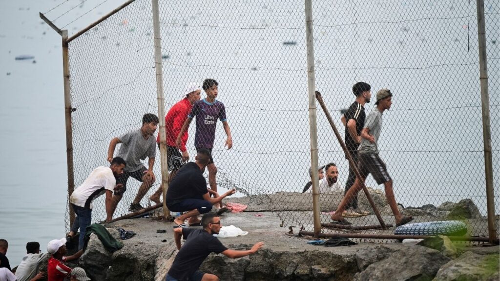 Migrants return back to Morocco, as seen from Ceuta, Spain, July 31, 2026, amid crossings by other migrants into Ceuta by sea and land. REUTERS/Fabian Bimmer