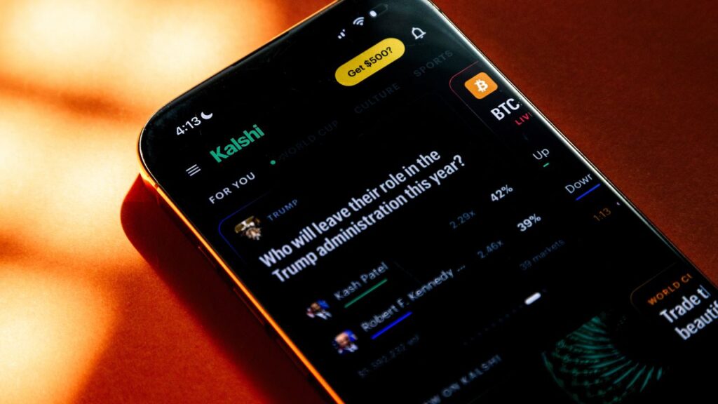 A smartphone running an app from the predictions market platform Kalshi, in New York on July 2, 2026. A federal judge on July 27 blocked a Minnesota state law that would ban prediction markets days before it was set to go into effect, siding with a federal financial regulator and two companies that had sued to stop it. (Eric Helgas/The New York Times)