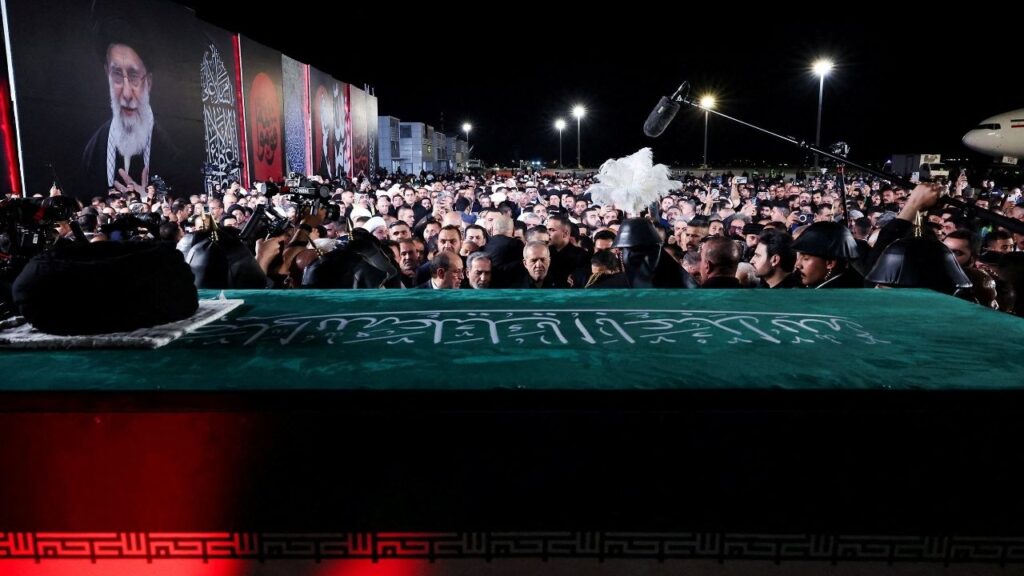 Mourners gather around the casket of Iran’s late Supreme Leader Ayatollah Ali Khamenei, who was killed on February 28 during Israeli and U.S. airstrikes on Iran, after its arrival at Najaf International Airport in Najaf, Iraq, July 7, 2026. Iran's Presidential website/HANDOUT via REUTERS