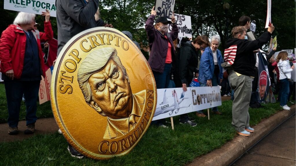 People protest a dinner President Donald Trump held for large buyers of his cryptocurrency tokens, at Trump National Golf Club in Sterling, Va., on May 22, 2025. Nearly 1 million people who bought Trump’s memecoin have lost money through the end of June 2026 according to a report by the cryptocurrency analytics firm Nansen. Their losses total $3.81 billion. (Elizabeth Frantz/The New York Times)