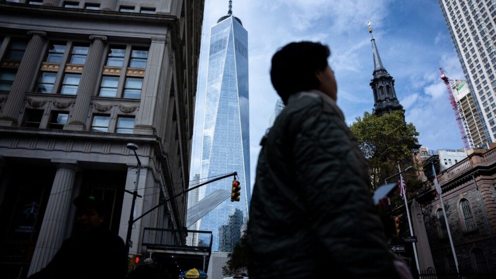 People walk around the Financial District on the morning after Zohran Mamdani’s election win in New York City, U.S., November 5, 2025. (Reuters/Angelina Katsanis)