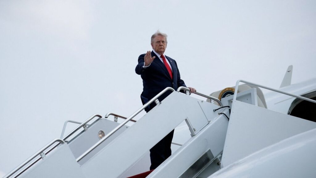 President Donald Trump gestures as he boards Air Force One en route to Michigan, at Joint Base Andrews, in Maryland, U.S., July 27, 2026. (Reuters/Evan Vucci)
