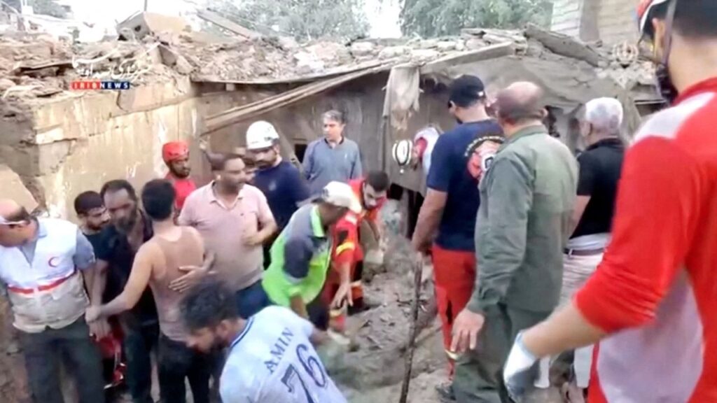 Rescuers clear rubble to search for victims following a strike in Qeshm, Iran, in this still image taken from video released July 30, 2026. IRIB/via Reuters TV/Handout via REUTERS
