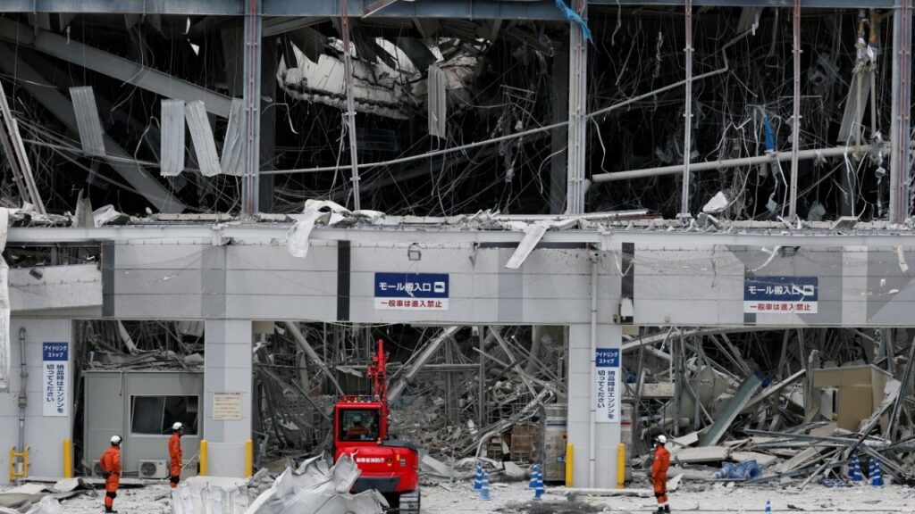 Rescuers work at the damaged Aeon Mall shopping centre, where an explosion occurred after an earthquake with a magnitude of 7.1 struck Japan's southern Kumamoto prefecture, in Kashima Town, Kumamoto Prefecture, Japan, July 29, 2026. (Reuters/Kim Kyung-Hoon)
