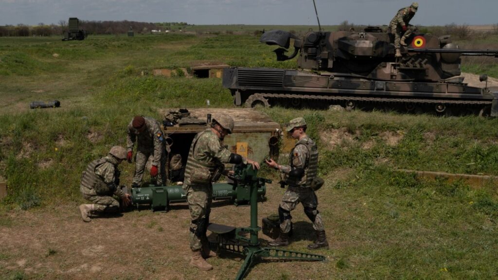 Romanian soldiers set up a KP-SAM Chiron, a portable surface to air missile launcher, during an exercise at the Capu Midia firing range in Romania, April 24, 2026. For Europe, the blitz of Russian strikes against Ukraine overnight was not just another reminder of the war next door. It was also a warning of how vulnerable the continent would be if the conflict were ever to cross into NATO territory. (Andreea Campeanu/The New York Times)