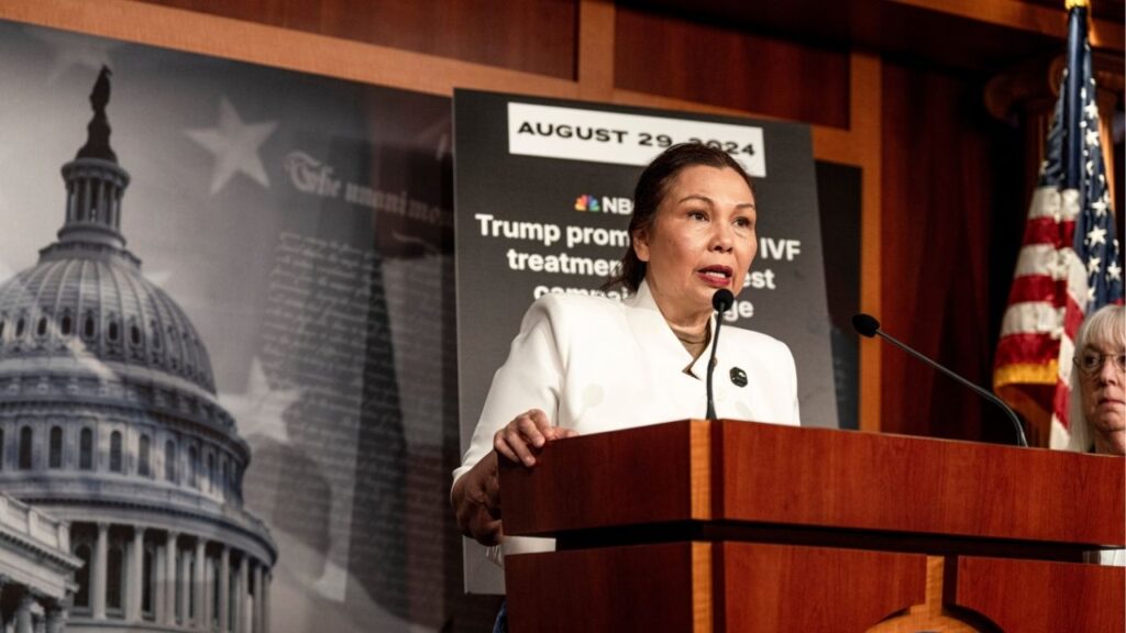 Sen. Tammy Duckworth (D-Ill.) speaks during a news conference about access to in vitro fertilization on Capitol Hill in Washington, July 23, 2026. In a notable shift, Republican senators voted unanimously against a proposal to expand the military’s coverage of fertility treatments. (Alex Kent/The New York Times)