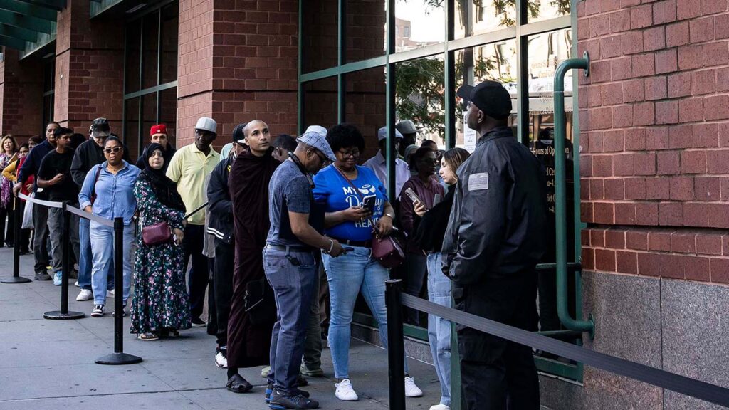 People wait in line outside of a Social Security Administration office in the Jamaica neighborhood of Queens, Sept. 8, 2025. The agency has been quietly hiring workers again, and its leadership is focused on improving technology to ease workloads left by the departure of about 7,800 staff members. (Dave Sanders/The New York Times)