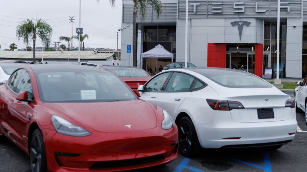 Tesla Model 3 vehicles are shown for sale at a Tesla facility in Long Beach, California, U.S., May 22, 2023. REUTERS/Mike Blake