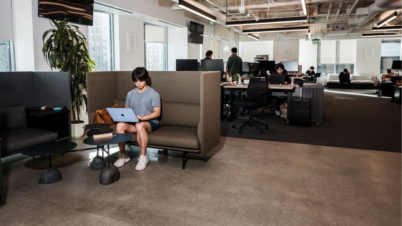 Employees at work in the offices of Mercor in San Francisco on July 29, 2025. The company says it pays more than $4 million to contractors every day. (Carolyn Fong/The New York Times)