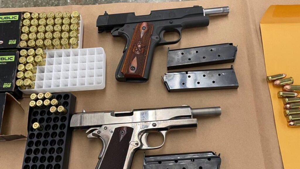 Two men were arrested in Delano after a reckless driving stop for "busting donuts" led officers to recover two pistols, including an unregistered ghost gun, police said. (Delano PD)