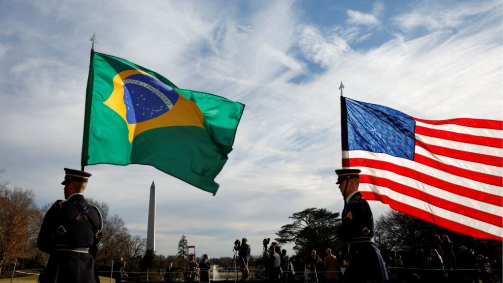 Guards hold U.S. and Brazilian flags at the White House in Washington, U.S., February 10, 2023. Reuters/Evelyn Hockstein/ File Photo