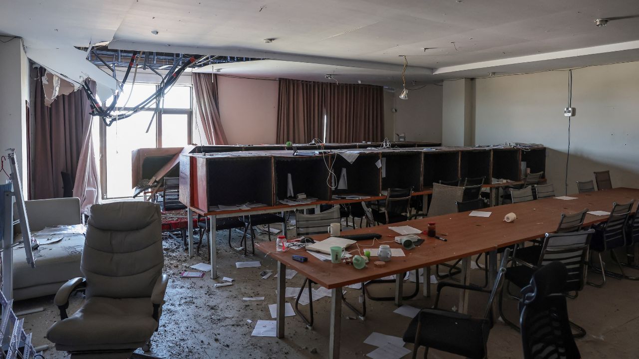 Rows of small boxes lined with acoustic foam, used by scammers to make calls to victims, are seen amid debris and a partially collapsed ceiling inside a compound in O'Smach used for scam operations in Samraong, Oddar Meanchey province, Cambodia, February 2, 2026. (REUTERS/Chalinee Thirasupa/File Photo)