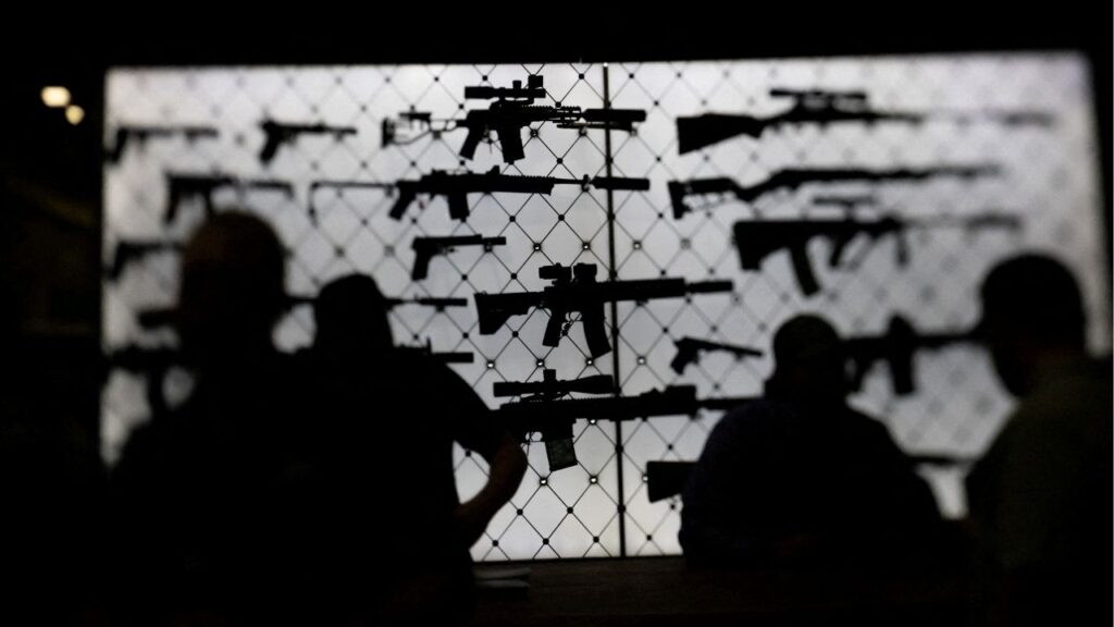 AR-15 rifles are displayed at an exhibition booth during the National Rifle Association (NRA) annual convention in Dallas, Texas, U.S., May 18, 2024. Picture taken with a tilt-shift lens. Reuters/Carlos Barria/File Photo