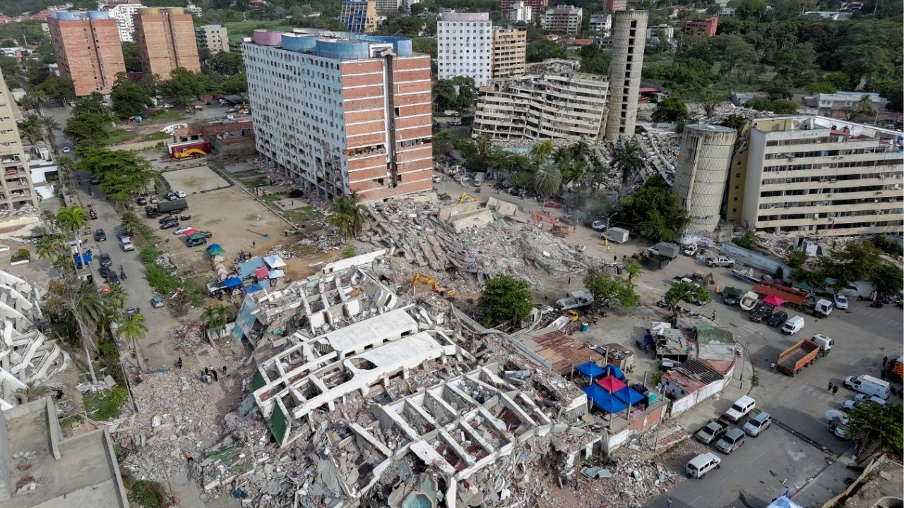 A drone view shows the remains of the apartment building where Maria Alejandra Sanz was trapped after twin earthquakes struck La Guaira, Venezuela, July 4, 2026. Reuters/Ricardo Arduengo