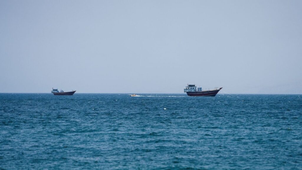 Vessels at the Strait of Hormuz, as seen from Musandam, Oman, July 26, 2026. (Reuters/Stringer)