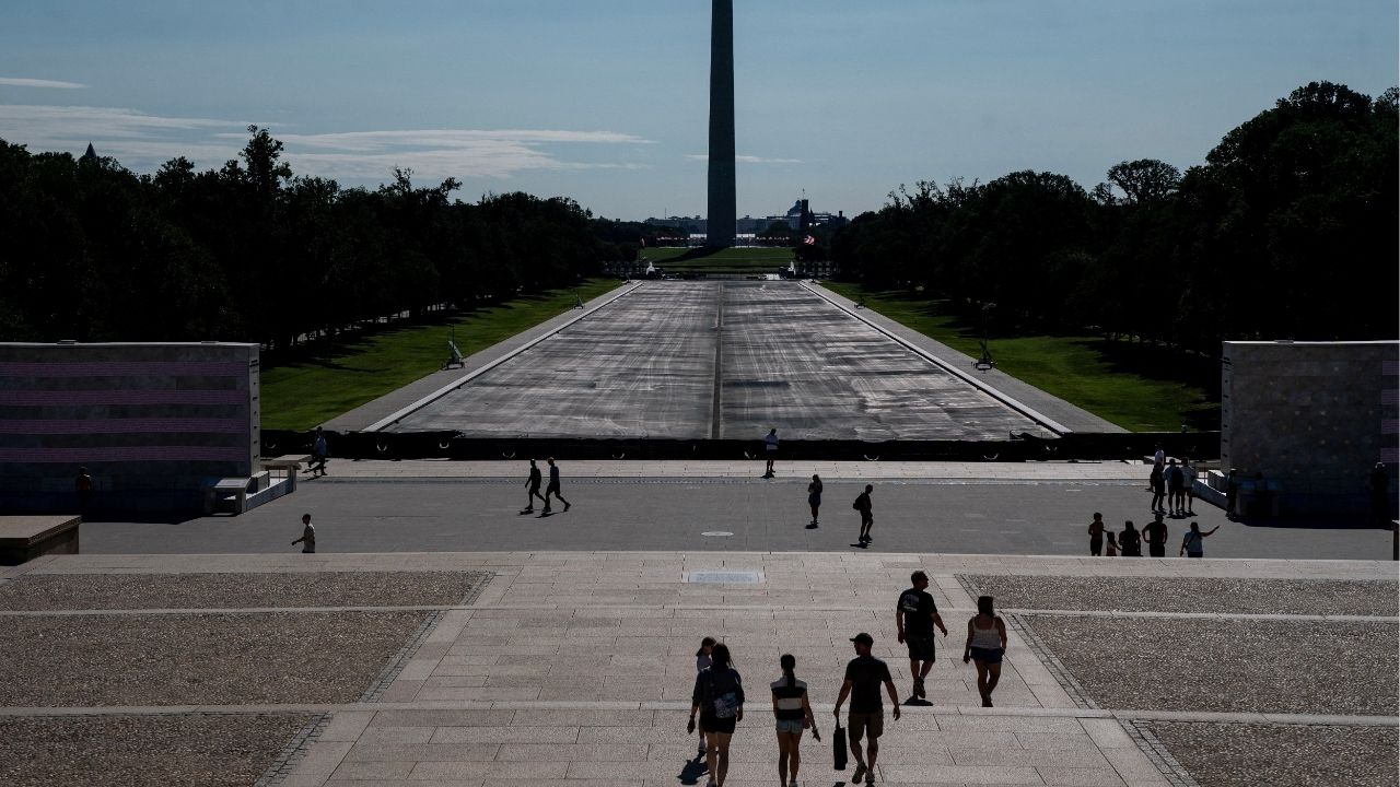 Visitors to the Lincoln Memorial walk near the drained Reflecting Pool, following renovations and Independence Day celebrations, in Washington, D.C., U.S., July 30, 2026. REUTERS/Nathan Howard