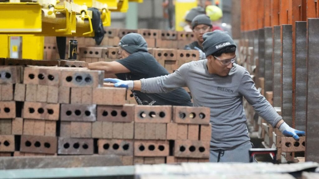 Workers package and cube pallet bricks for shipping at Belden Brick in Sugarcreek, Ohio, U.S., November 12, 2025. Kevin Whitlock/Massillon Independent/USA TODAY NETWORK via Imagn Images via REUTERS