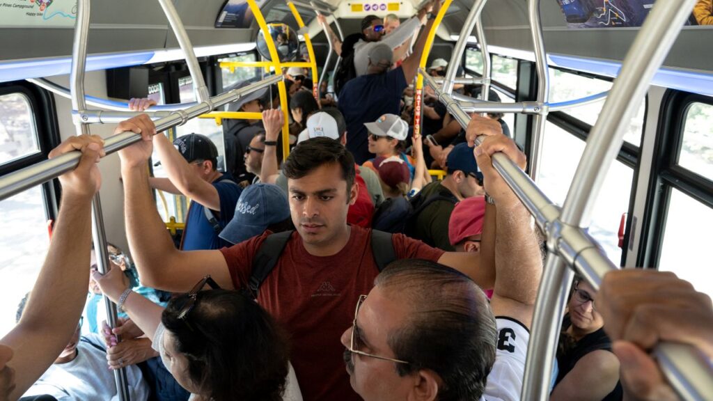 Image of Yosemite visitors packed into a shuttle bus