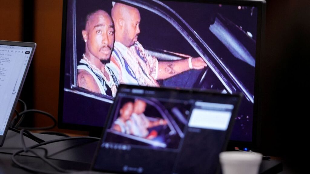 A 1996 photo of rapper Tupac Shakur and Marion “Suge” Knight is shown on screens during closing arguments in the Duane Davis murder trial, related to the 1996 killing of rapper Tupac Shakur, in Clark County District Court at the Regional Justice Center in Las Vegas, Nevada, U.S., August 31, 2026. REUTERS/Steve Marcus/Pool