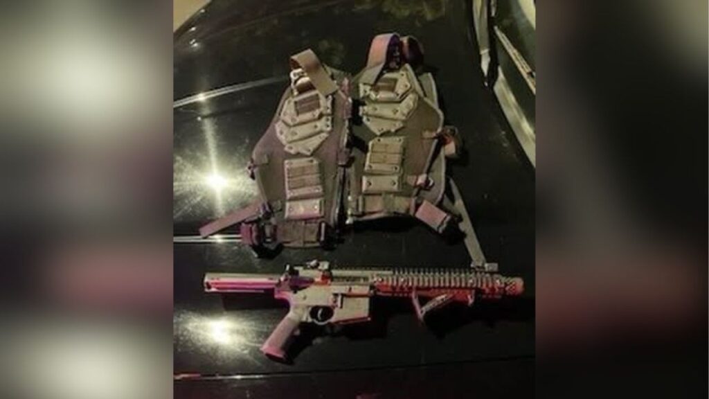 A 34-year-old man was arrested early Sunday after police received multiple reports of a bicyclist wearing what appeared to be body armor and carrying an AR-15-style rifle in downtown Visalia. (Visalia PD)